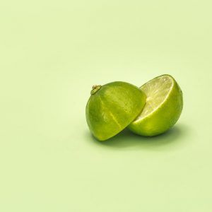 lime-cut-in-half-on-green-surface-2